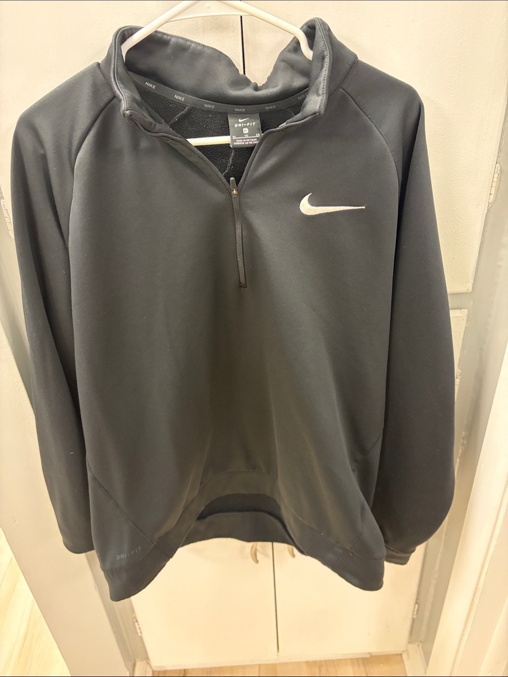 Nike Black Quarter-Zip Athletic Pullover with White Swoosh